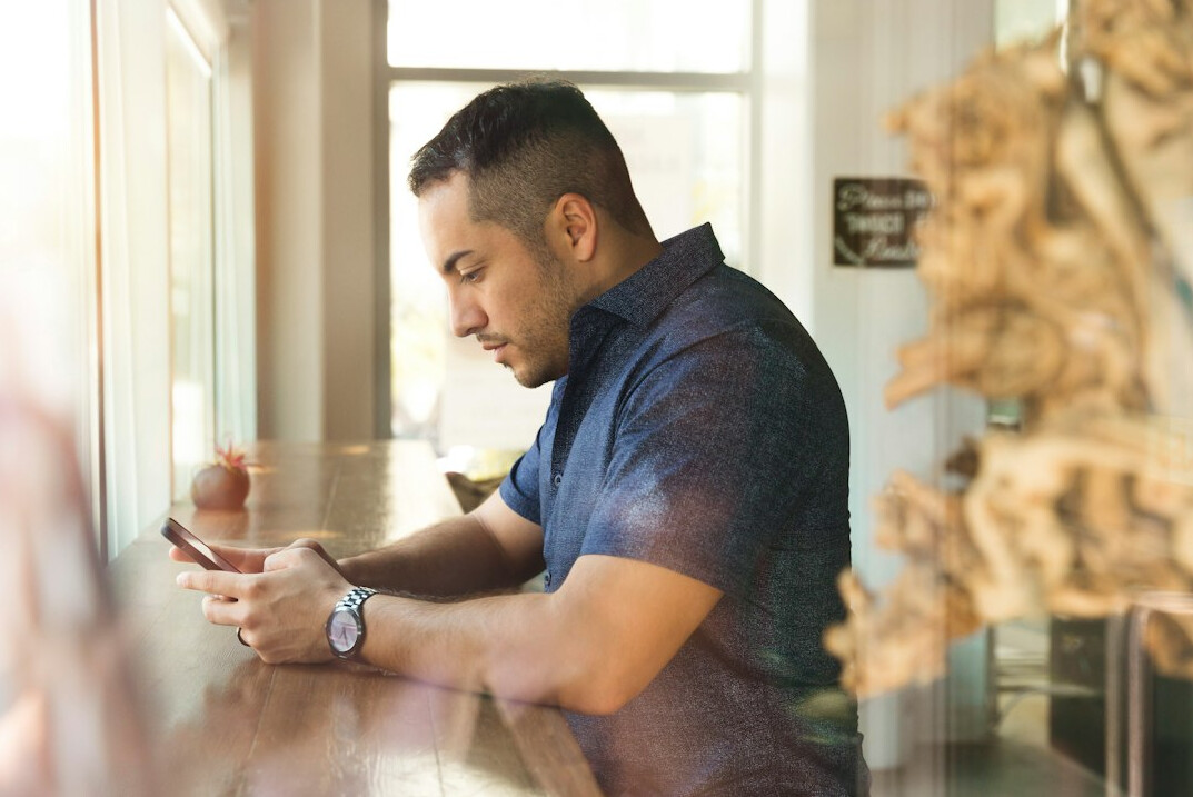 busy professional checking health app