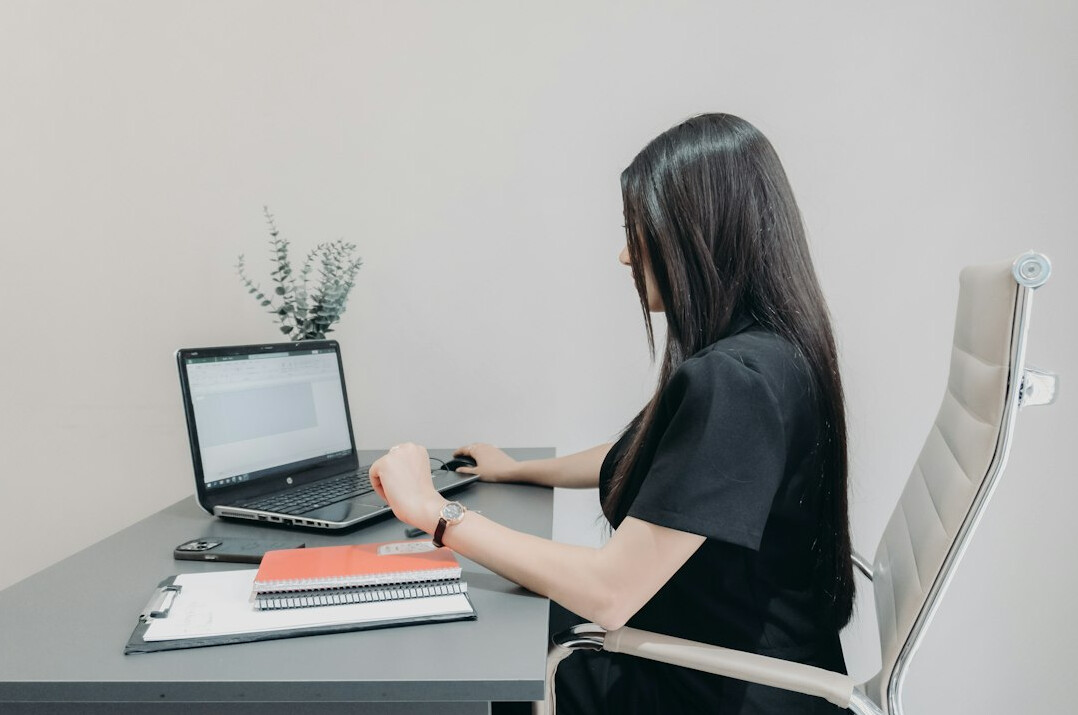 person doing quick stretch at work