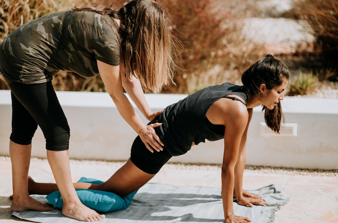 Health coach guiding a client through a one on one session
