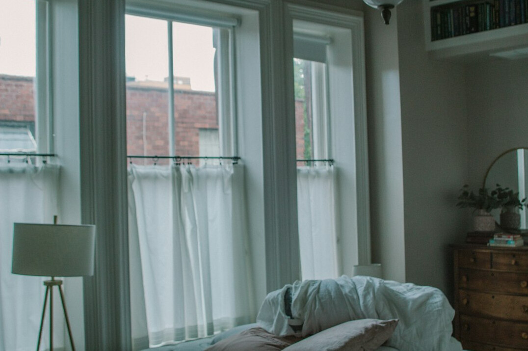 person journaling in morning light