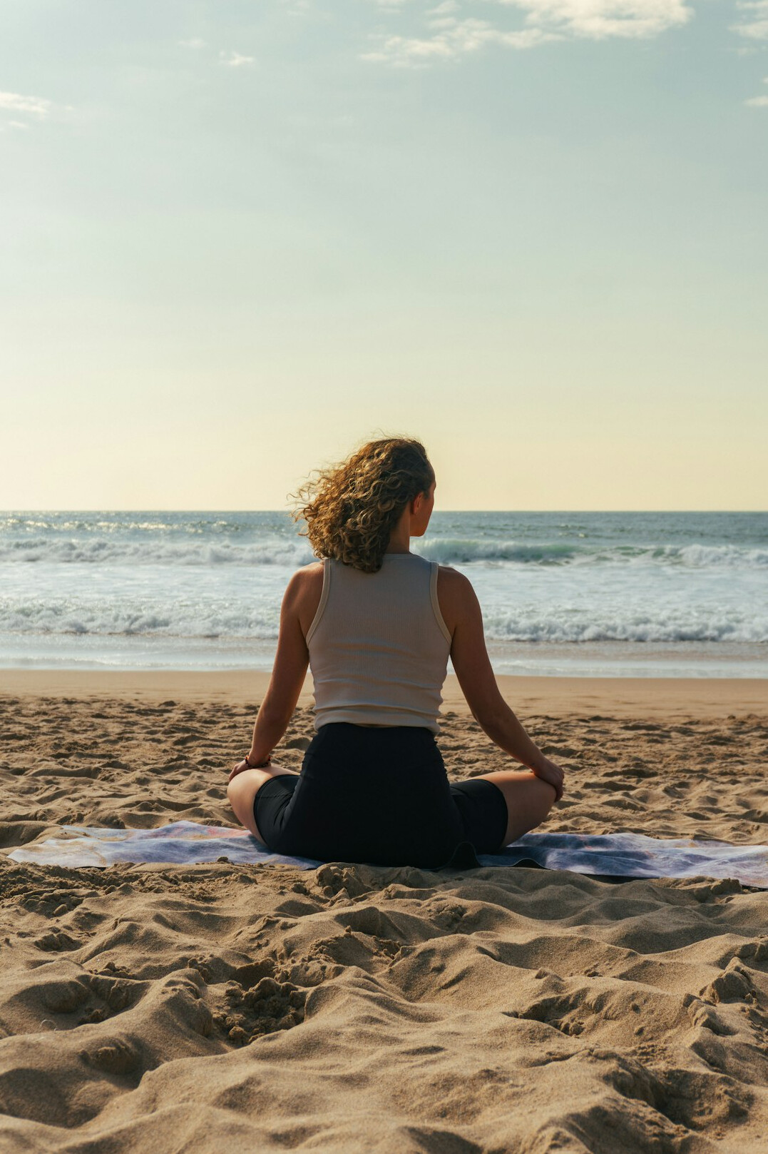 person meditating in nature